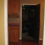 Turned right, looking into kitchen, bfast area & out into garage.